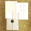 Gold vine vellum wedding invite wax seal
