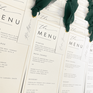Individually named wedding menu with ribbon eyelet