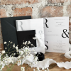 Manhattan wedding invitation vellum sleeve bellyband black and white