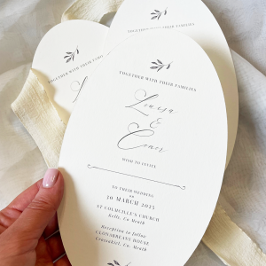 Oval invitation with vellum & crushed silk ribbon