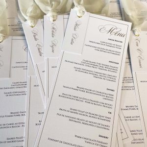 Ivory Ribbon Name Tag Wedding Menus with gold eyelet