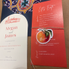 Seville arch orange wedding menu with name tag