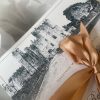 gold border wedding invitation venue sketch bow