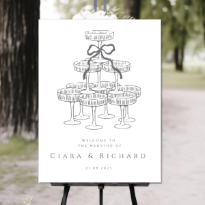 champagne tower welcome sign