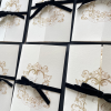 Crest gatefold with velvet bow velvet ribbon