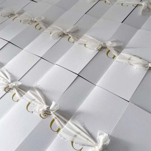Ivory initials with ribbon